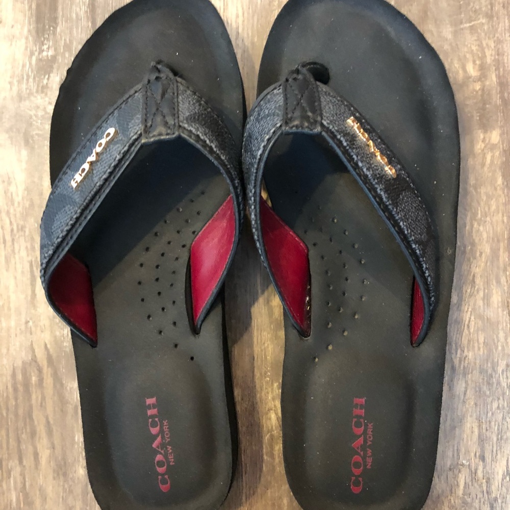 Black women’s size flip flops from coach